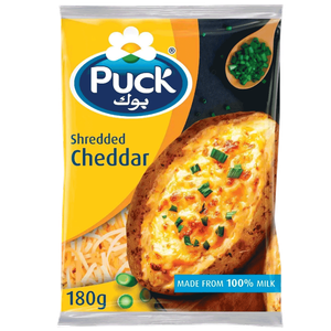 Puck Cheddar Shredded Cheese